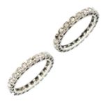 Two platinum diamond full eternity rings