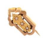 Unmarked yellow metal brooch set three rose cut diamonds