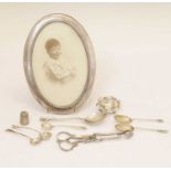 George V silver photograph frame, George VI silver figural spoon, A.E. Jones, and sundry silver