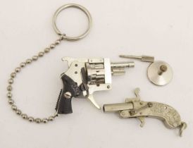 Berloque type miniature pistol, together with an Austrian Xythos miniature revolver