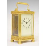 Gilt metal cased carriage timepiece