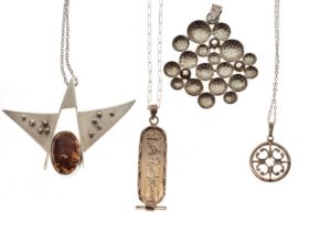 Four silver pendants