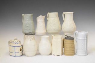 Collection of relief-moulded stoneware jugs