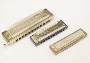 Group of three harmonicas