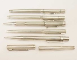 Two silver Smythson ball point pens and Asprey pens