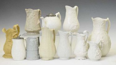 Collection of 19th century and later relief-moulded stoneware jugs etc