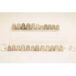 Collection of silver thimbles, together with a small quantity of base metal and ceramic thimbles