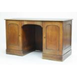 Mahogany twin pedestal desk