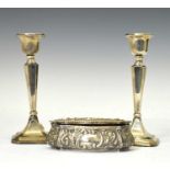 Pair of silver candlesticks and a silver dressing table box