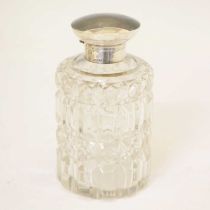 Silver-lidded perfume bottle
