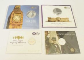 Two Royal Mint fine silver £100 coins, together with two £20 coins