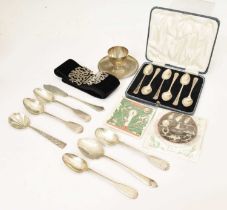 Cased set of six George V silver teaspoons, silver egg cup, etc