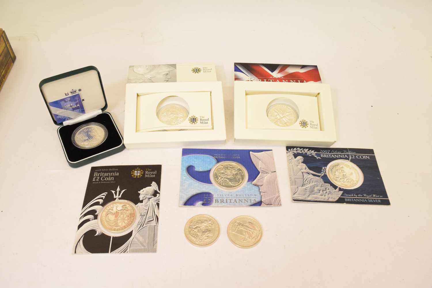 Eight Queen Elizabeth II silver Britannia coins