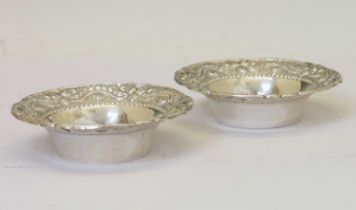 Pair of Indian white-metal circular dishes or bowls