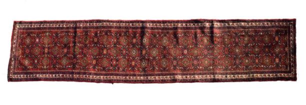 Middle Eastern red ground wool runner