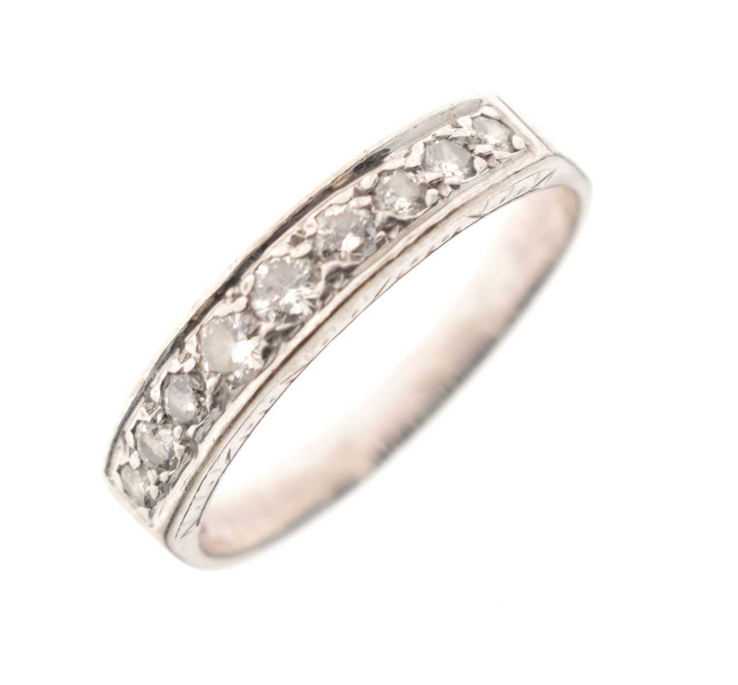 Diamond set half eternity ring