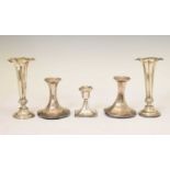Pair of Victorian silver bud vases, together with a pair and single dwarf candlesticks