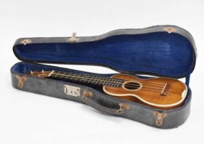 C.F. Martin & Co of Nazareth PA - 4 string Ivorine inlaid ukelele