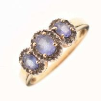 Diamond and blue stone cluster ring