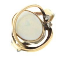 Modernist gold ring set opal cabochon and two small diamonds