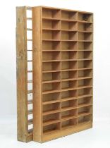 Pair of pitch pine shelf units, by repute ex Passport Office