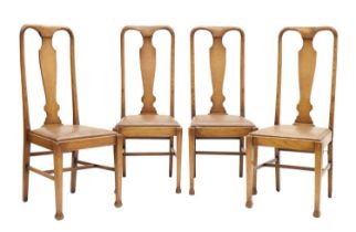 Set of four Queen Anne style light oak dining chairs