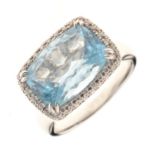 18ct white gold blue topaz and diamond dress ring