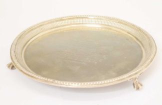 Victorian silver salver with beaded border and standing on three claw and ball feet