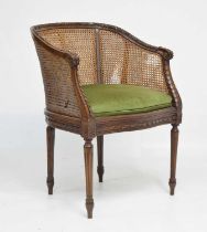 Early 20th century carved bergere caned tub chair
