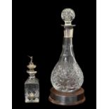 Elizabeth II silver collared Hogget/Hoggit decanter, together with silver capped small decanter
