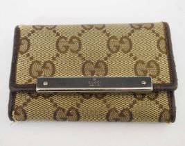 Gucci - Monogrammed canvas key holder