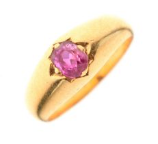 Single stone ring set faceted oval ruby