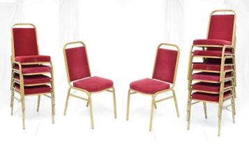 Set of twelve gold finish stacking function or banqueting chairs with red upholstery (12)