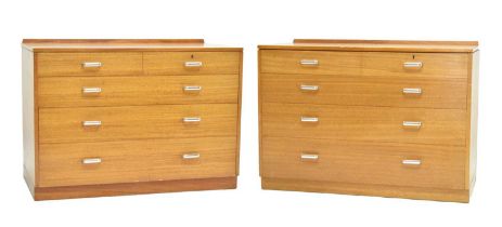 Pair of teak retro chests of two short over three long graduated drawers