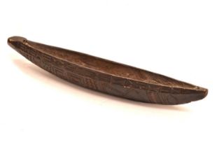 Ethnographica - Carved softwood canoe-shaped food bowl