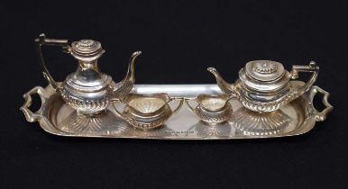 Elizabeth II miniature silver four-piece tea set and tray