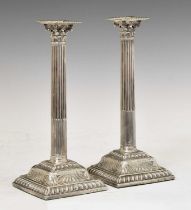 Pair of early George III silver Corinthian column candlesticks