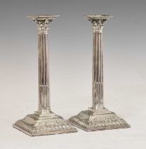 Pair of early George III silver Corinthian column candlesticks