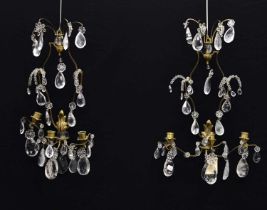 Pair of early 20th century gilt metal, rock crystal and cut glass wall appliqués