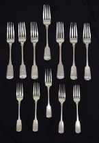 Seven silver Fiddle pattern table forks and five silver dessert forks, possibly Irish