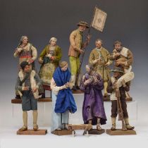 Nine Neapolitan painted terracotta and limewood Nativity presepio figures