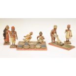 Six 19th century Indian polychrome painted wooden figures