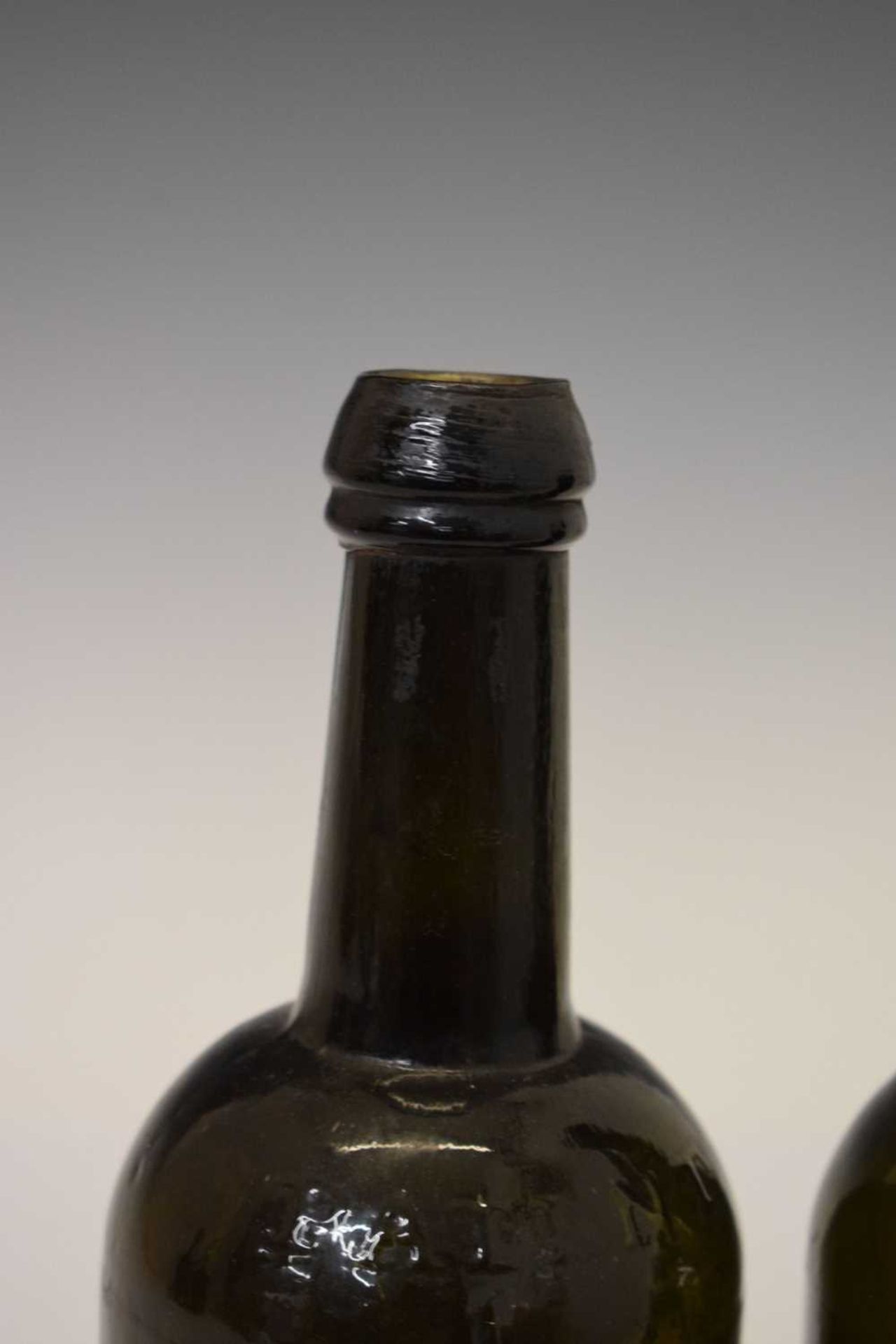 Two early 19th century dark green glass Utility bottles - Image 8 of 18