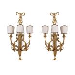 Pair of gilt bronze sconces with three lights