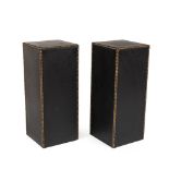 Pair of square bases covered in leather with brass studs