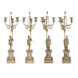 Four three lights silver candlesticks