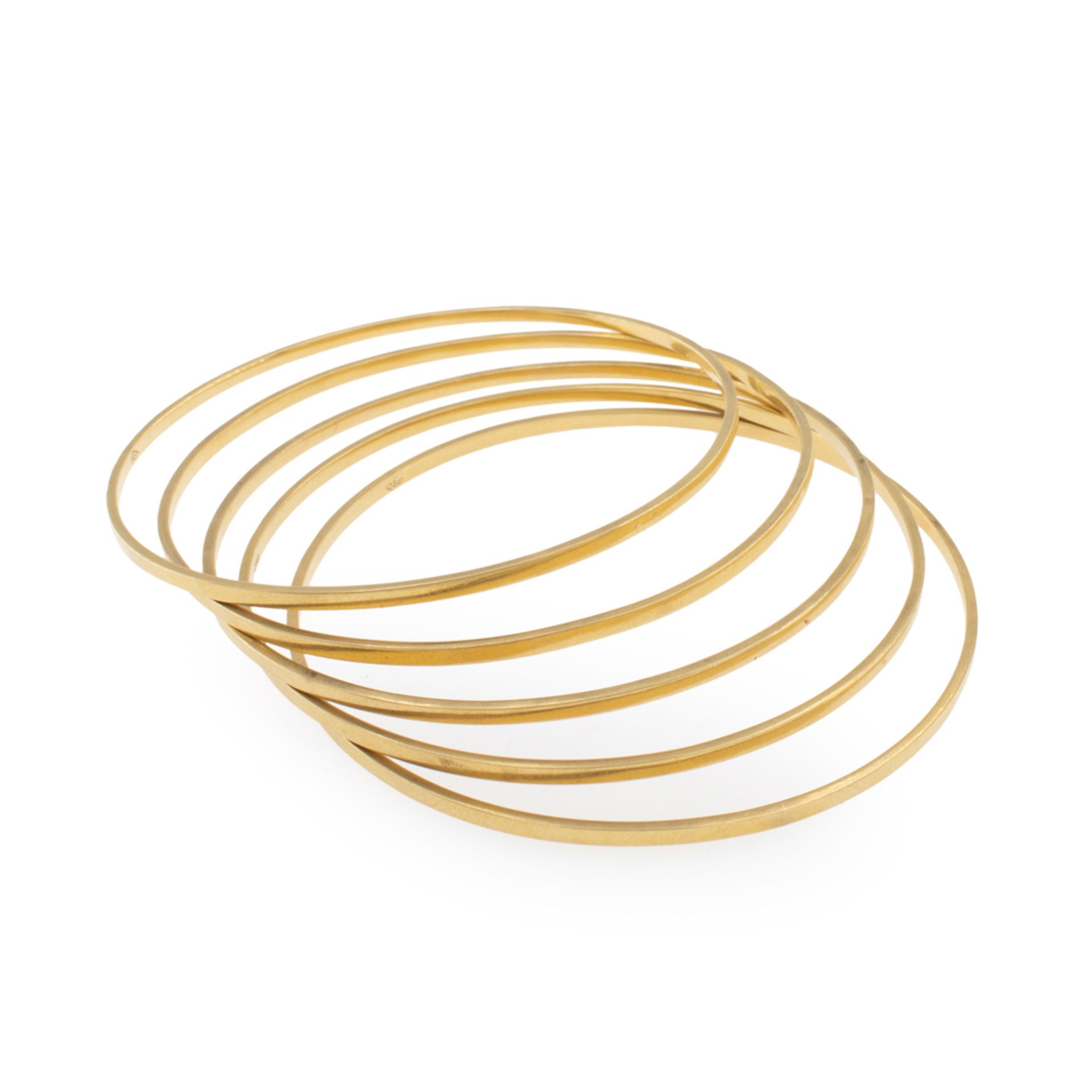 Five 18kt yellow gold cuff bracelets