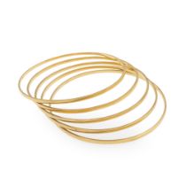 Five 18kt yellow gold cuff bracelets