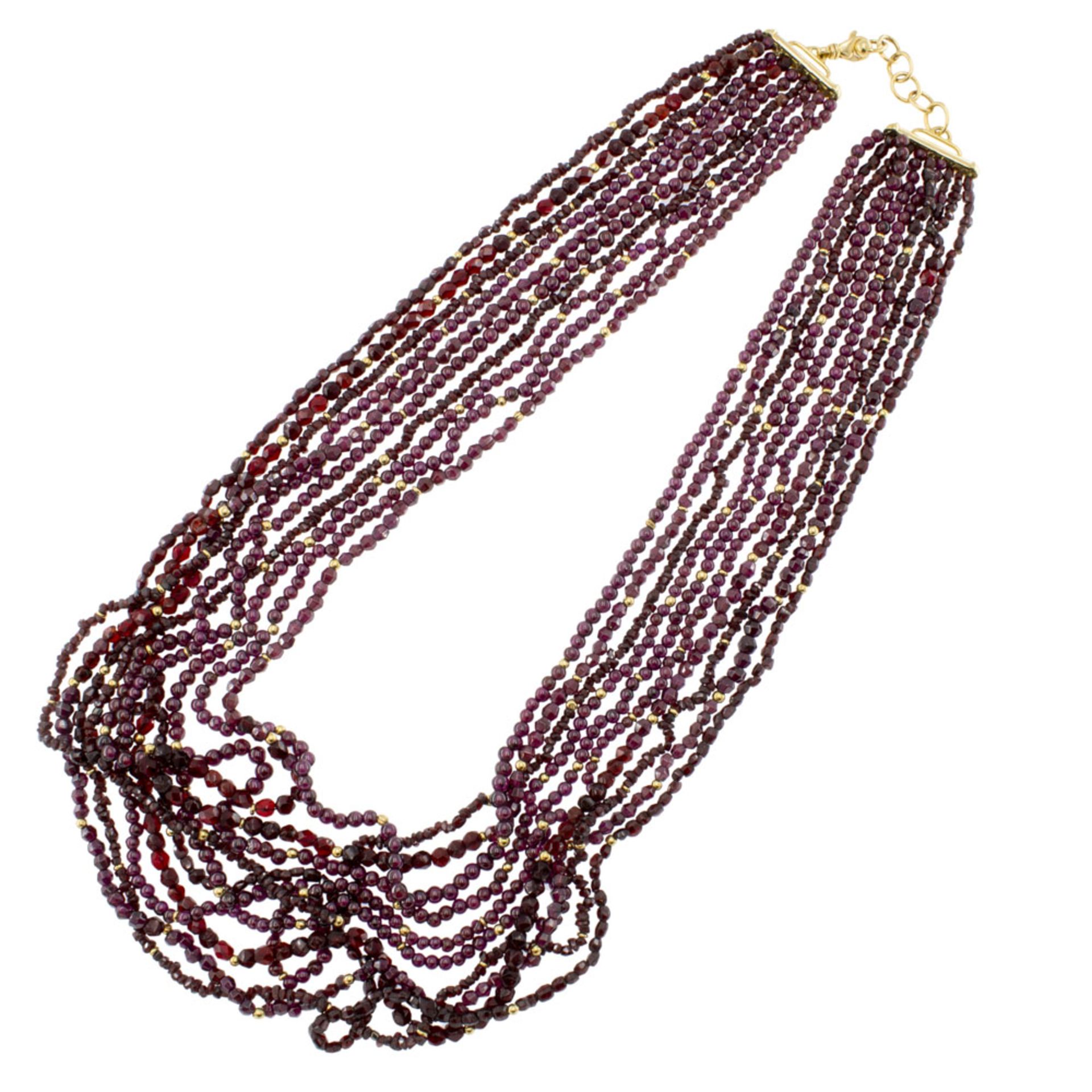 Ten-strand garnet and 18kt yellow gold necklace