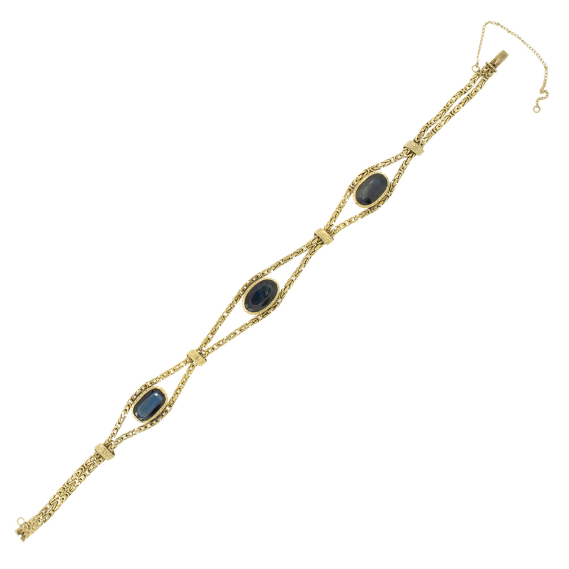 18kt yellow gold bracelet with three sapphires